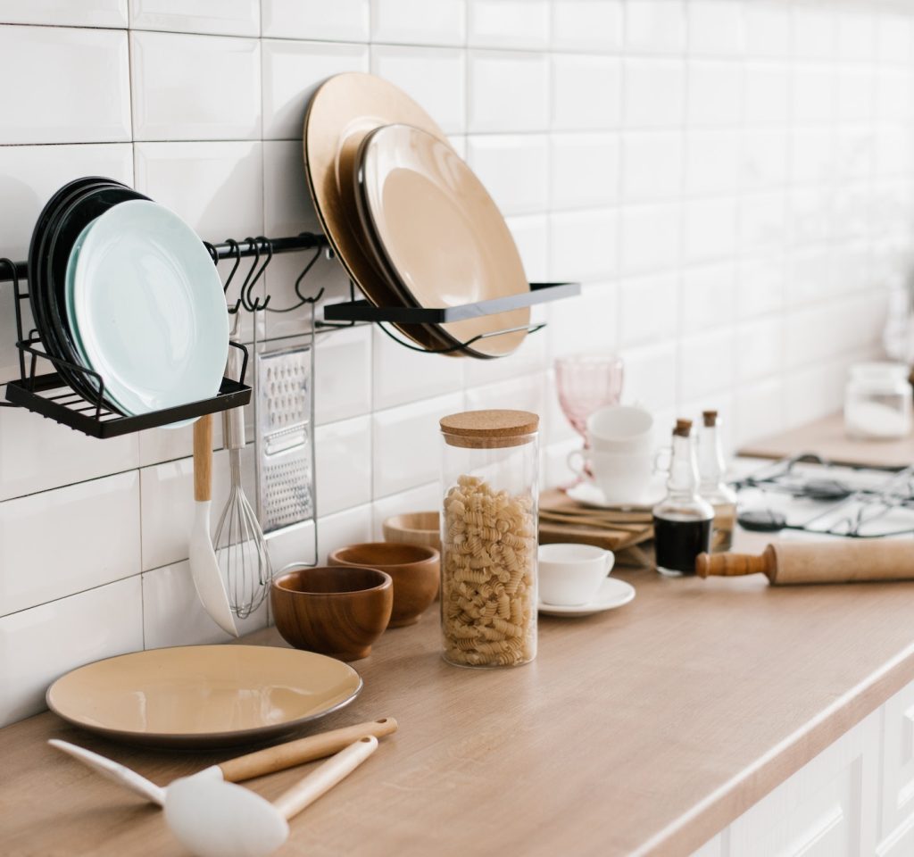Kitchen utensils are on the cabinet. The interior of the room in the Scandinavian style